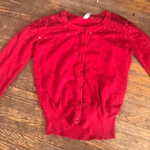 A red formal sweater